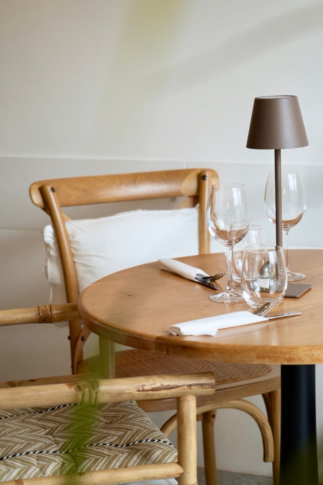 Table laid in the restaurant's indoor room