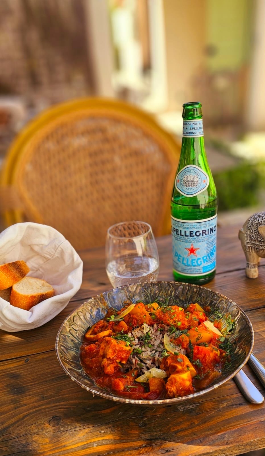 Slow-cooked spiced dish, served in the restaurant garden