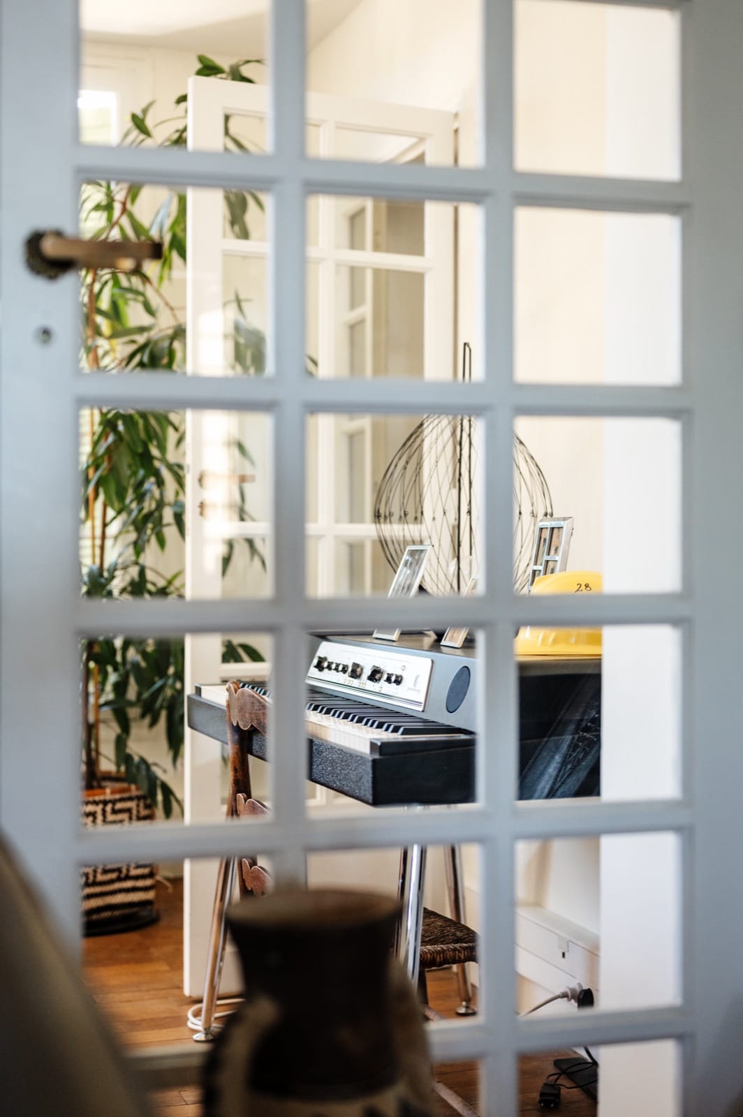The piano behind the glass door, to carry the evening on