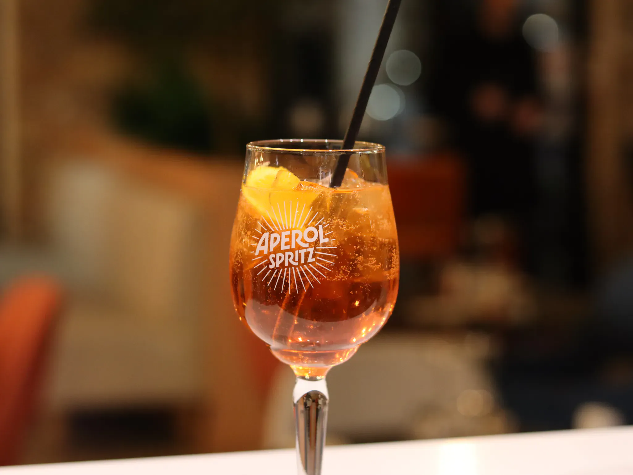 Aperol Spritz served as an aperitif at the table