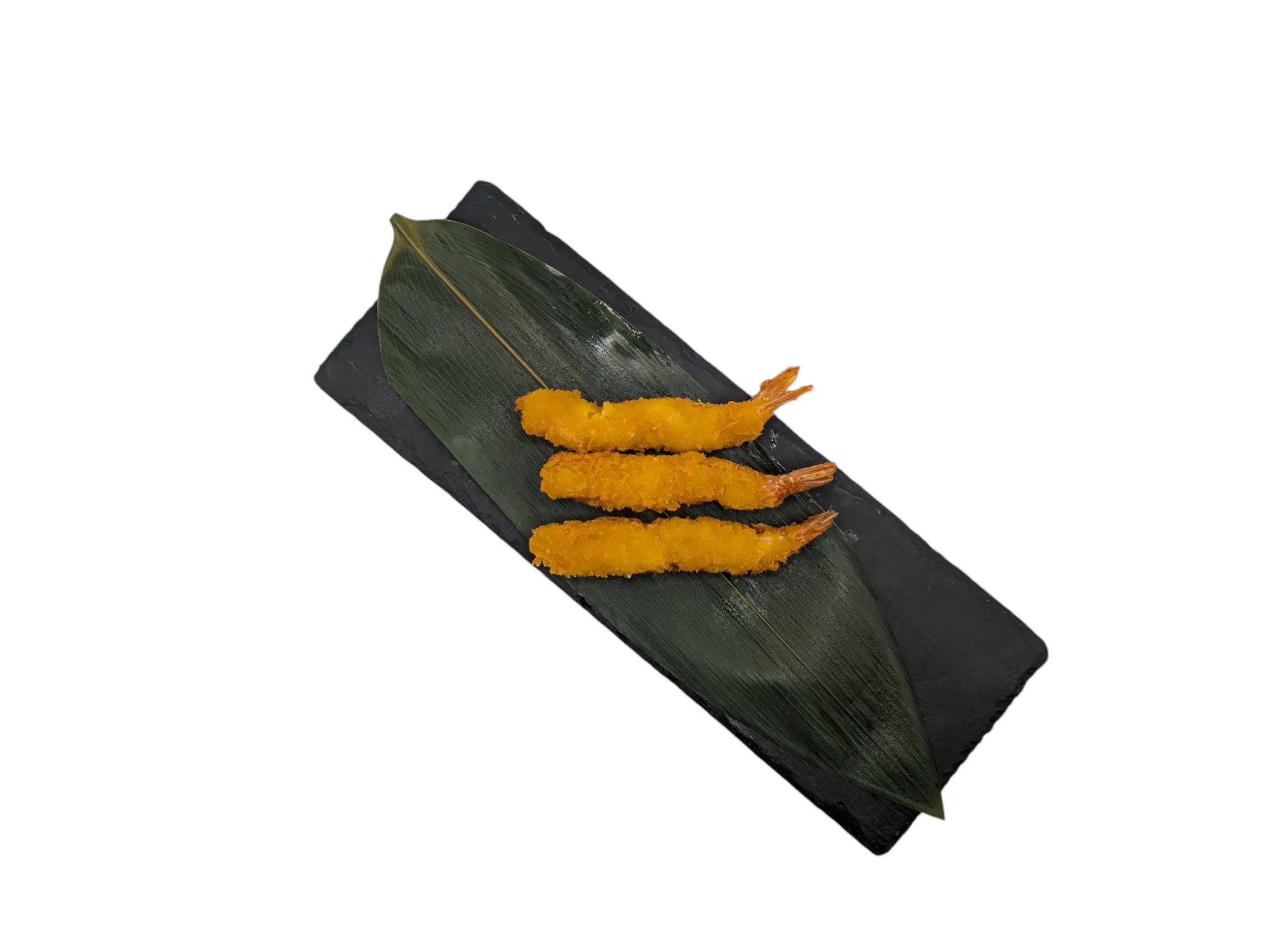 Crevettes tempura panées et dorées sur ardoise, écho au croustillant des bouchées japonaises poêlées