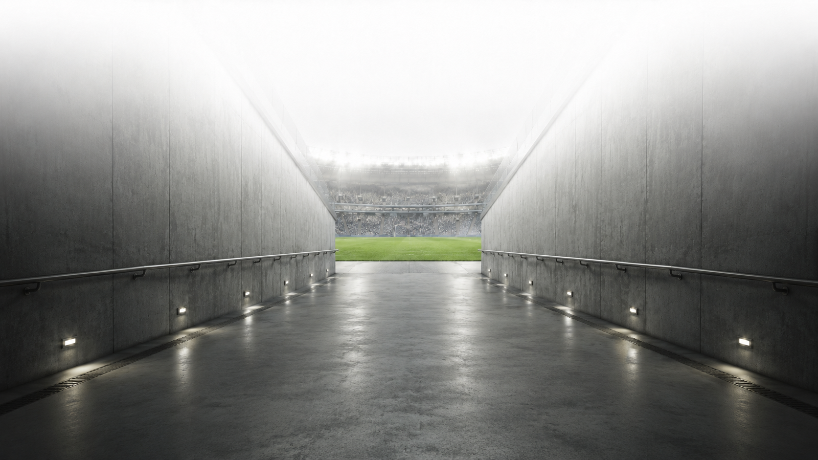 Tunnel de stade donnant sur la pelouse, l'ambiance des grandes affiches suivies dès le Pack Starter