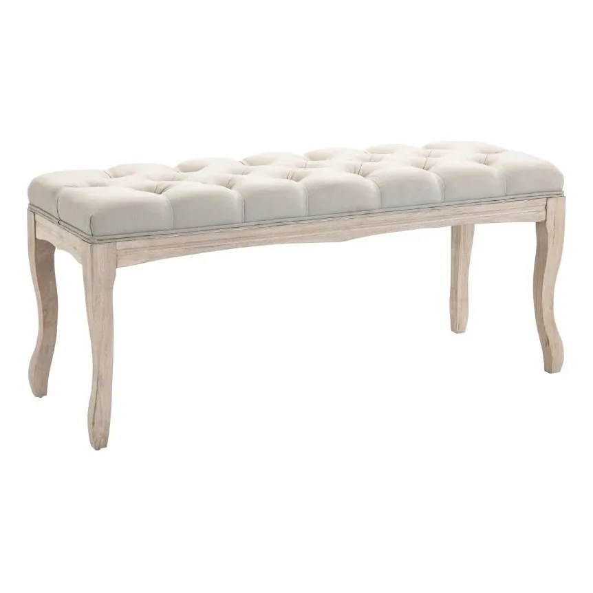 Banquette à assise capitonnée en tissu beige sur pieds galbés en bois cérusé, détourée sur fond blanc.