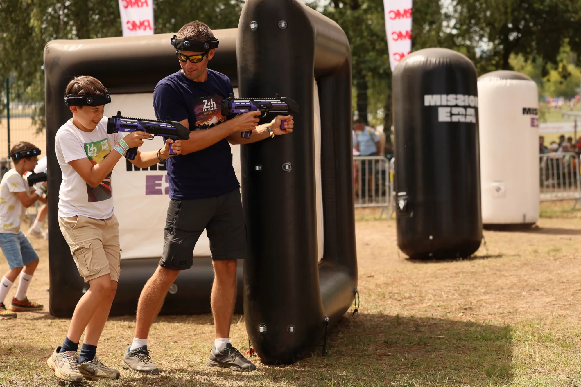 Public en animation immersive Krun Game outdoor sur la Fan Zone d'un grand événement (GP Explorer, 24h du Mans)